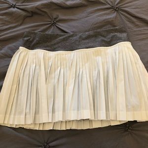 white pleated lululemon skirt